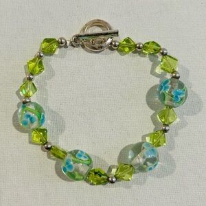 Artisan Made Art Glass Green Beaded Bracelet with Blue Floral Accents